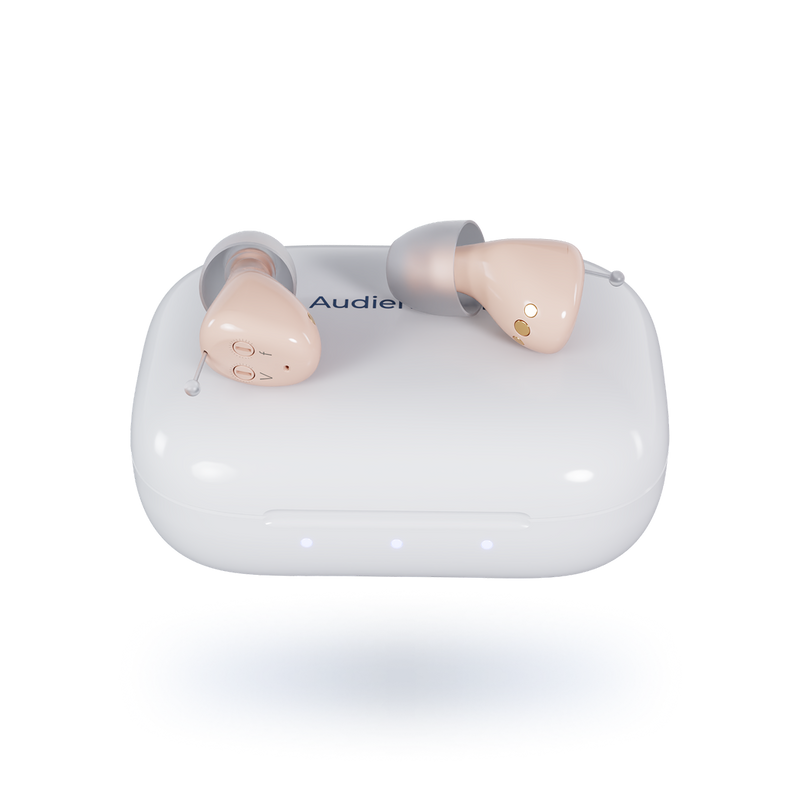 Pair of beige Audien earbuds in a clear case on a white background