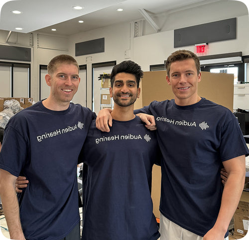 Audien Hearing company team in the office mobile version