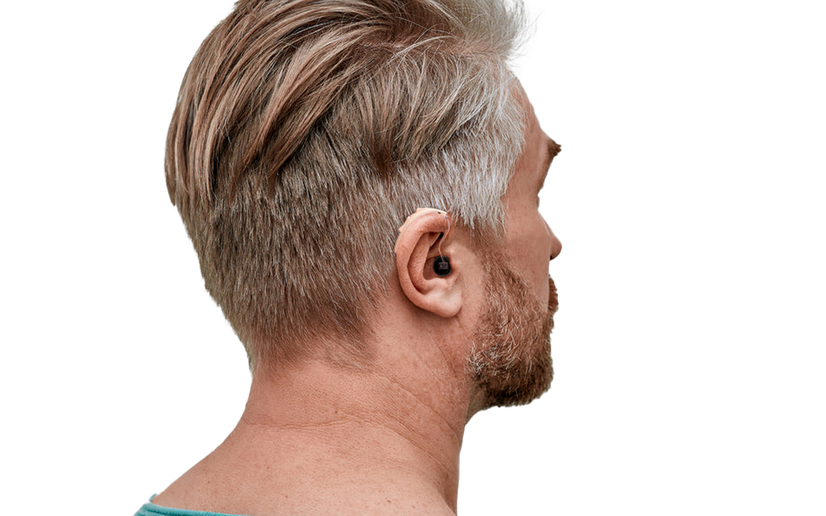 Man wearing Audien in-ear hearing aid viewed from behind for discreet appearance